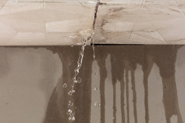 Professional Water Damage Restoration technician working in Drewsville, NH